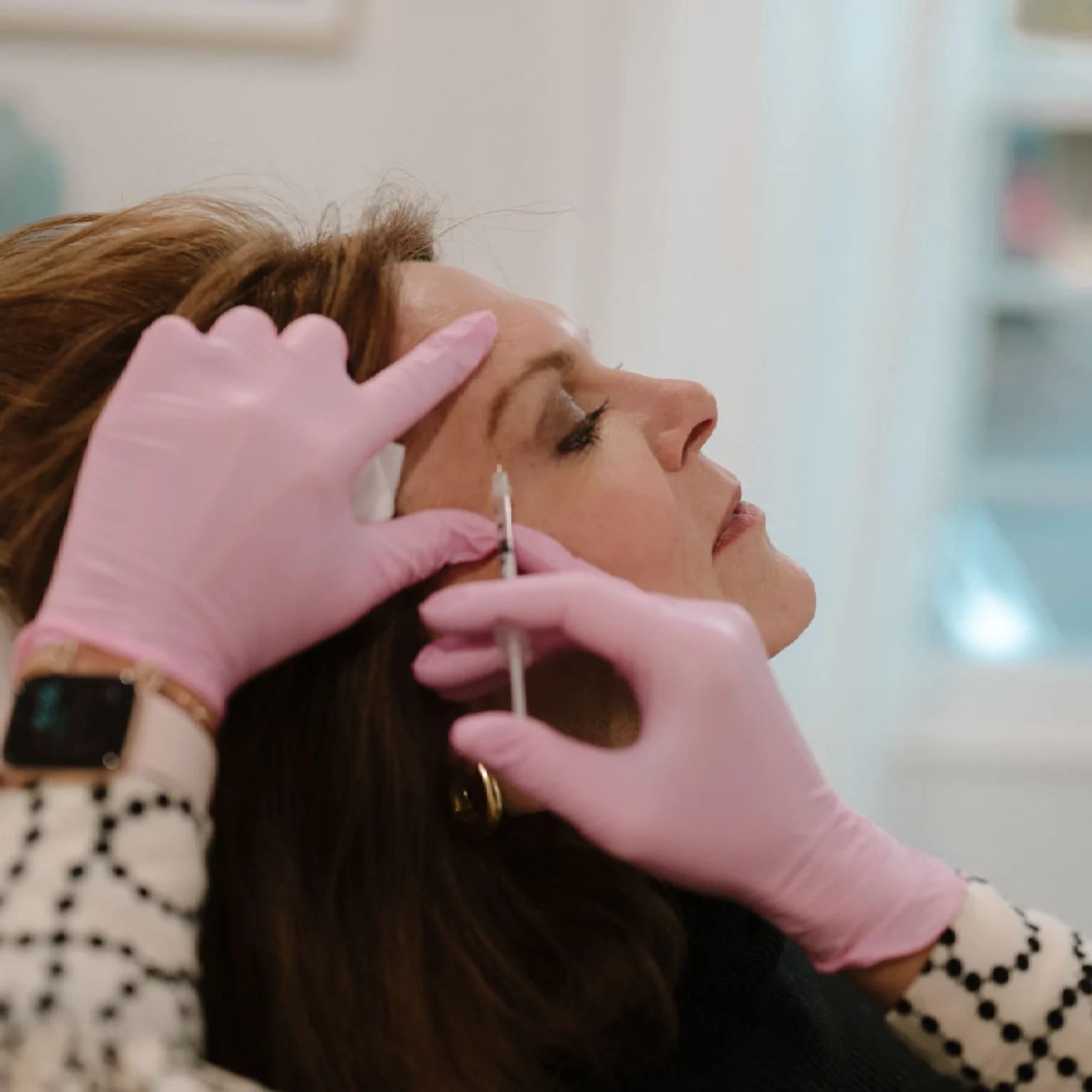 Patient receiving Botox injections at Modern SLC Injections & Aesthetics
